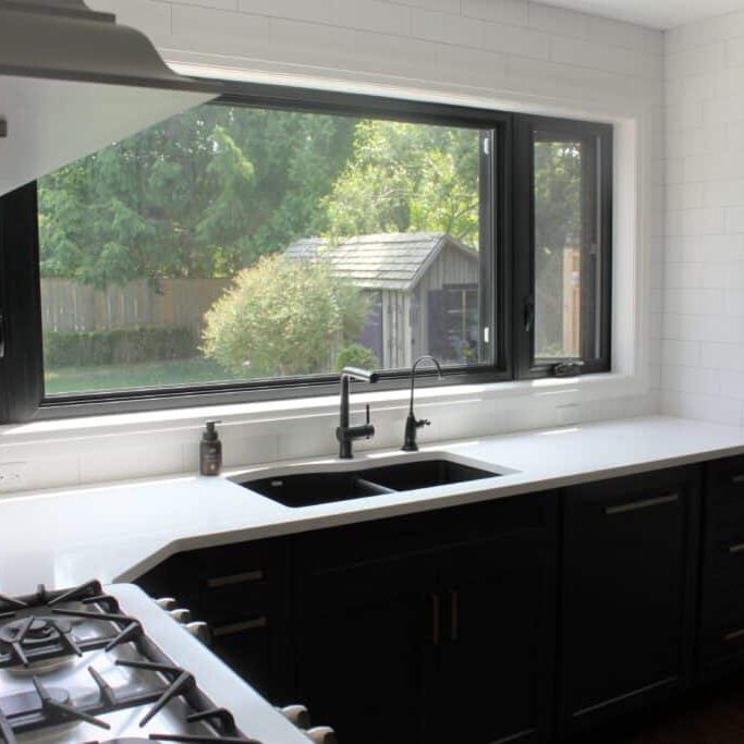 Oversized 3 sectional casement window over sink_3